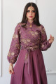 A purple suit of a wrap shirt with an elegant cloche dress