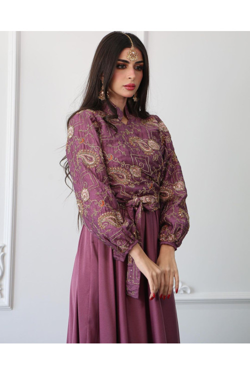 A purple suit of a wrap shirt with an elegant cloche dress