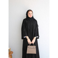 Black abaya patterned with leaves