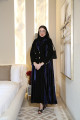 A luxurious blazer abaya mixed with royal blue