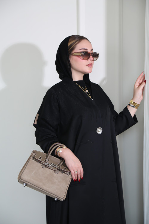 Black abaya with a luxurious pearl button