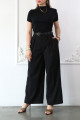 Wide black pants with pleats and a front zipper