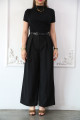 Wide black pants with pleats and a front zipper