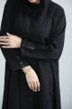 Practical patterned abaya with black buttons