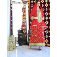 A traditional dress in fiery red color with sheila