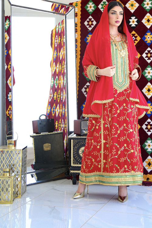 A traditional dress in fiery red color with sheila