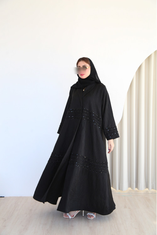 Abaya decorated with luxurious handmade shawl in a circular shape