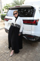 عاجي- أسود