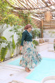 Turquoise jacket set with layered skirt
