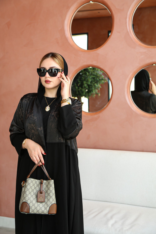 Soft abaya with raw material decorated on the upper part in brown