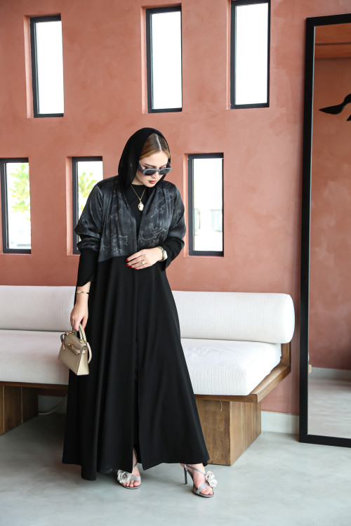 Soft abaya with raw material decorated on the upper part in gray