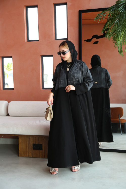 Soft abaya with raw material decorated on the upper part in gray