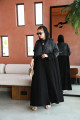 Soft abaya with raw material decorated on the upper part in gray