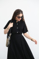 Black set with short-sleeved shirt and pleated skirt