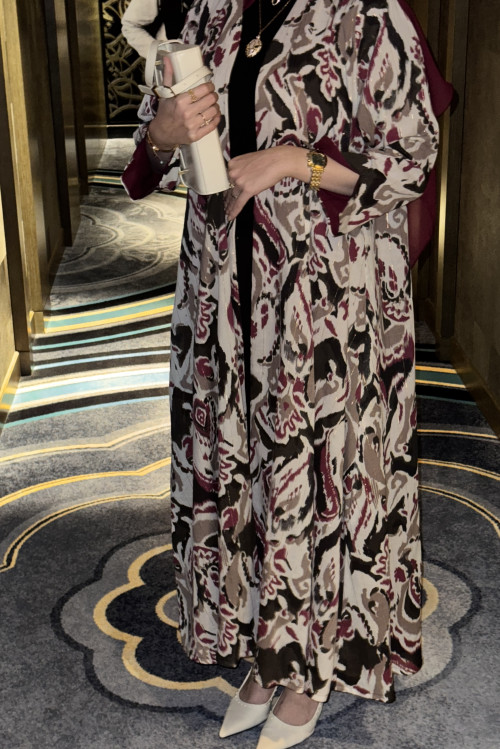 Abaya with a modern design with geometric patterns