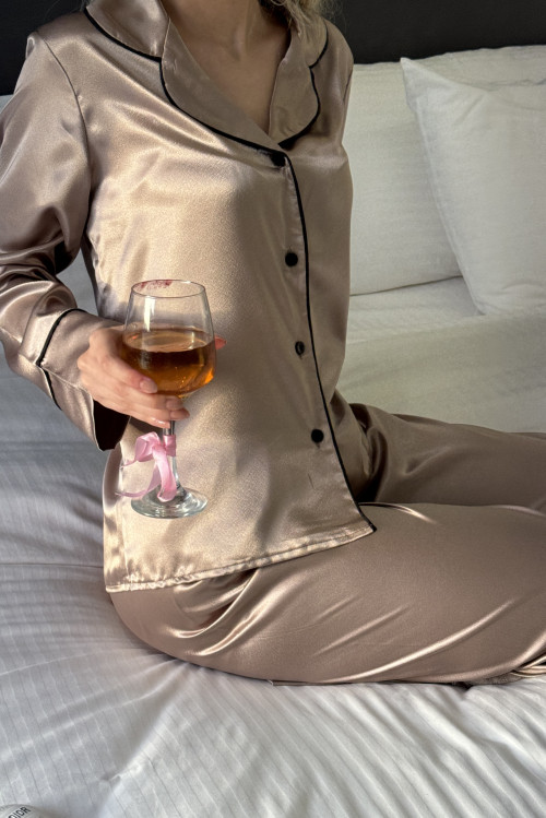 Soft flesh-colored pajamas with black buttons