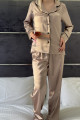 Soft flesh-colored pajamas with black buttons