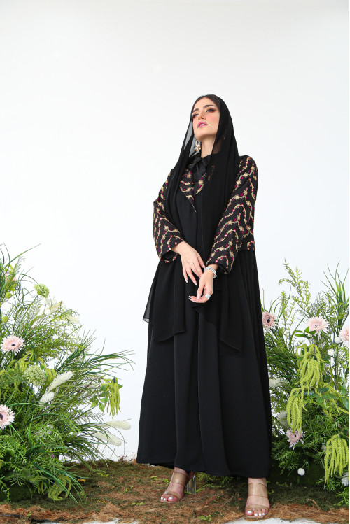 Abaya with black linen, gold and fuchsia embroidery