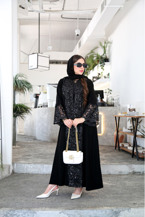 Abaya combining luxurious crepe with questionable organza