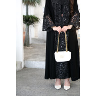 Abaya combining luxurious crepe with questionable organza
