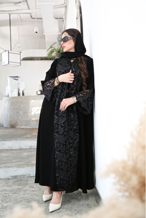 Abaya combining luxurious crepe with questionable organza