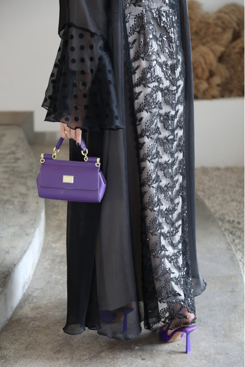 Black abaya with a combination of materials