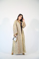 A luxurious pistachio bisht with a wrap dress