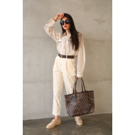 Cream colored trousers