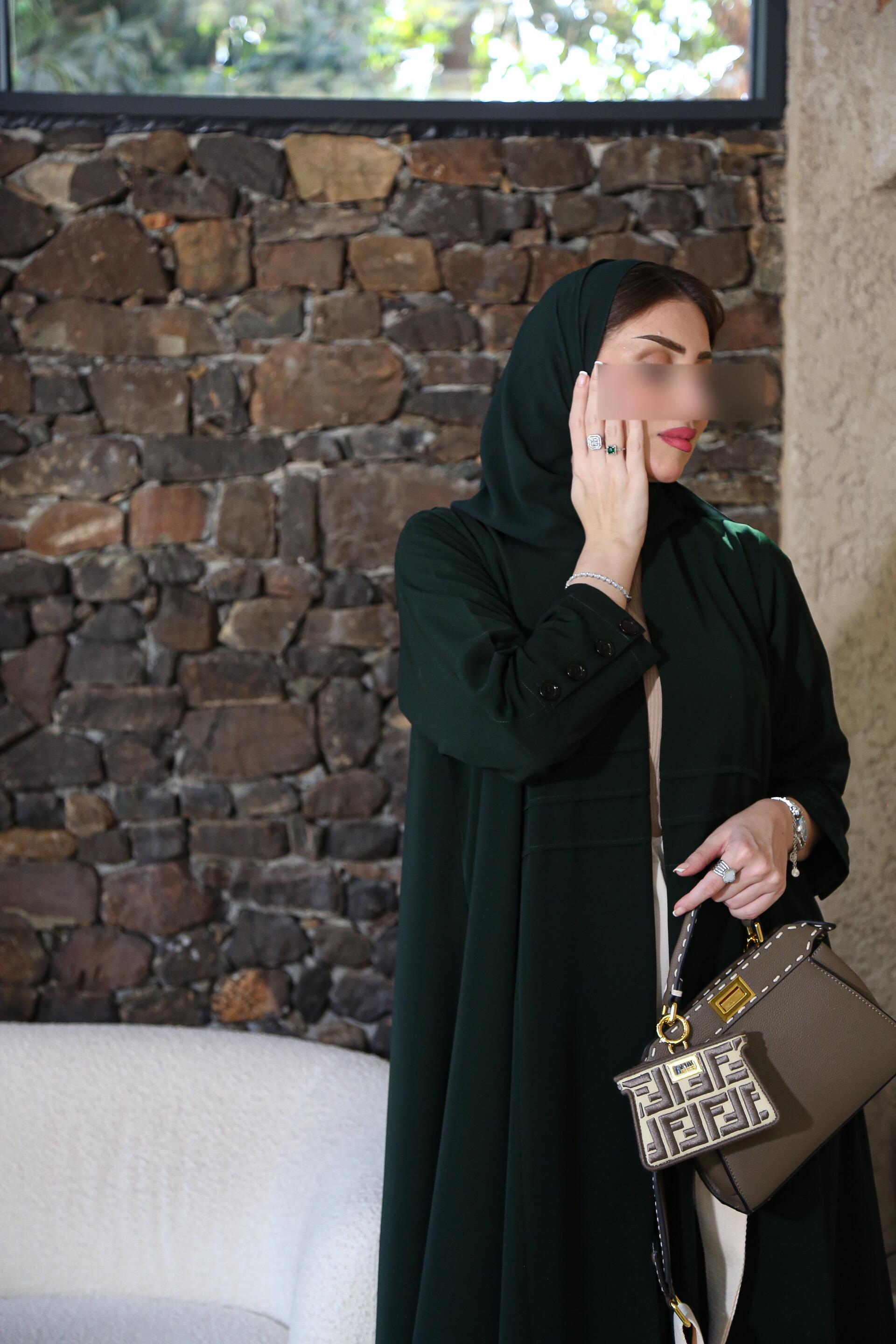 عباية عملية باللون الاخضر